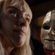 Batwoman's Rachel Skarsten is held captive by new arrival Wallis Day in a creepy wood mask.